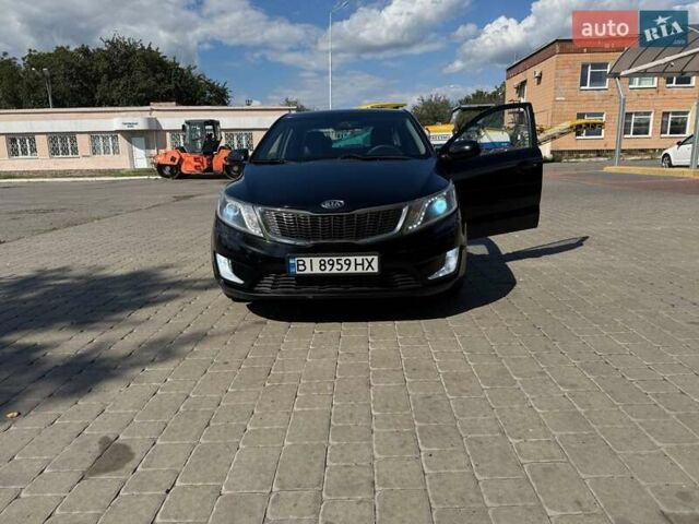 Чорний Кіа Ріо, об'ємом двигуна 1.4 л та пробігом 158 тис. км за 8300 $, фото 20 на Automoto.ua