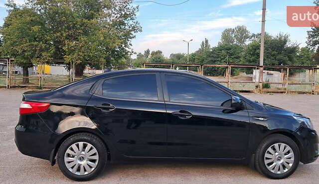 Черный Киа Рио, объемом двигателя 1.4 л и пробегом 89 тыс. км за 6800 $, фото 3 на Automoto.ua