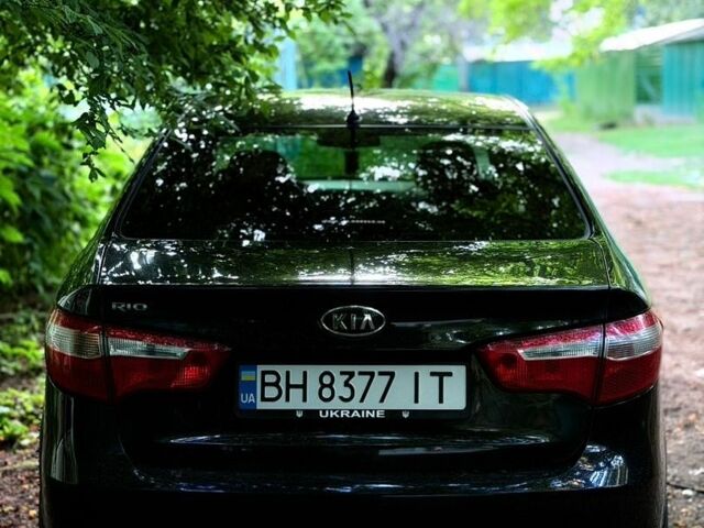 Чорний Кіа Ріо, об'ємом двигуна 1.6 л та пробігом 104 тис. км за 8500 $, фото 11 на Automoto.ua