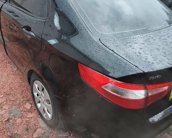 Черный Киа Рио, объемом двигателя 1.4 л и пробегом 170 тыс. км за 8500 $, фото 4 на Automoto.ua