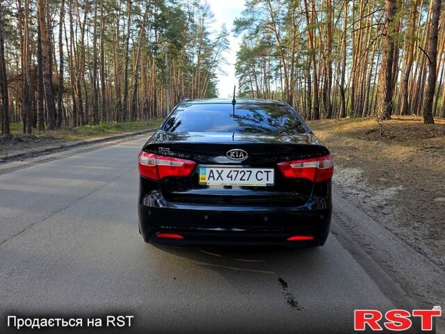 Черный Киа Рио, объемом двигателя 1.6 л и пробегом 103 тыс. км за 6800 $, фото 4 на Automoto.ua
