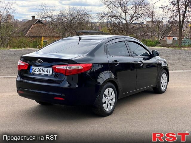 Чорний Кіа Ріо, об'ємом двигуна 1.4 л та пробігом 170 тис. км за 7800 $, фото 1 на Automoto.ua