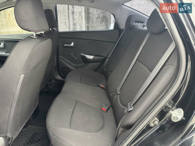 Черный Киа Рио, объемом двигателя 1.4 л и пробегом 155 тыс. км за 7500 $, фото 31 на Automoto.ua