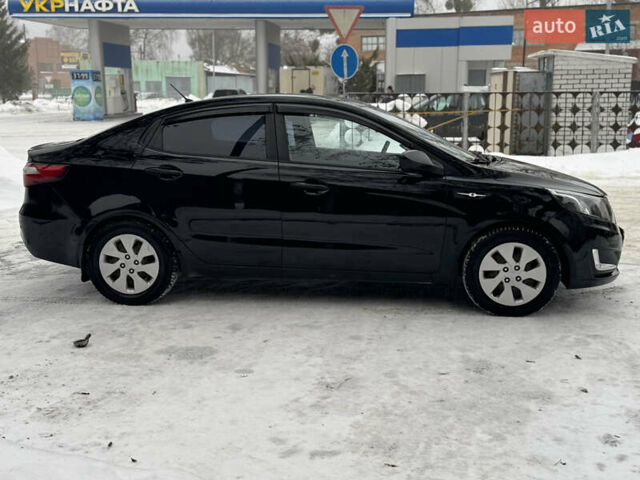 Черный Киа Рио, объемом двигателя 1.4 л и пробегом 155 тыс. км за 7500 $, фото 5 на Automoto.ua