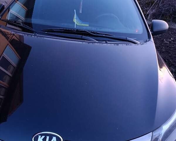 Чорний Кіа Ріо, об'ємом двигуна 1.4 л та пробігом 162 тис. км за 7500 $, фото 4 на Automoto.ua