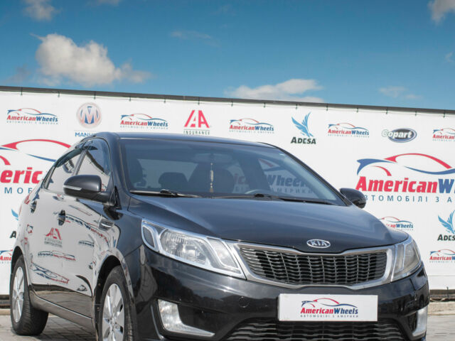 Чорний Кіа Ріо, об'ємом двигуна 1.6 л та пробігом 144 тис. км за 9500 $, фото 2 на Automoto.ua