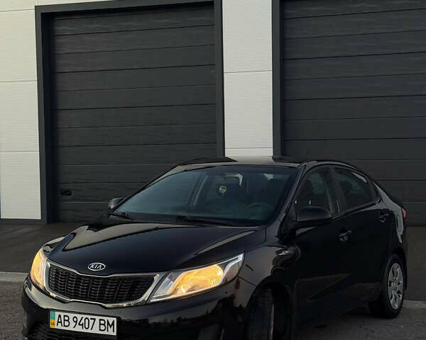 Чорний Кіа Ріо, об'ємом двигуна 1.4 л та пробігом 136 тис. км за 6900 $, фото 2 на Automoto.ua
