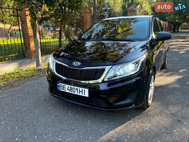 Чорний Кіа Ріо, об'ємом двигуна 1.4 л та пробігом 165 тис. км за 7900 $, фото 14 на Automoto.ua