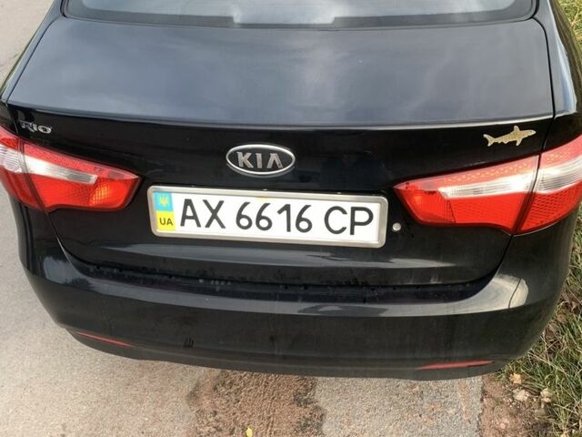 Чорний Кіа Ріо, об'ємом двигуна 1.4 л та пробігом 190 тис. км за 5500 $, фото 11 на Automoto.ua