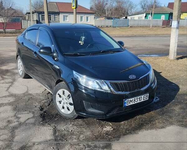 Чорний Кіа Ріо, об'ємом двигуна 1.4 л та пробігом 92 тис. км за 7200 $, фото 2 на Automoto.ua