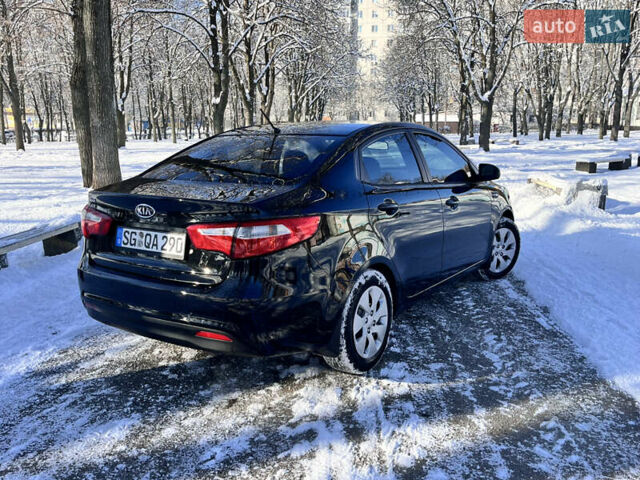 Чорний Кіа Ріо, об'ємом двигуна 1.4 л та пробігом 245 тис. км за 7600 $, фото 12 на Automoto.ua