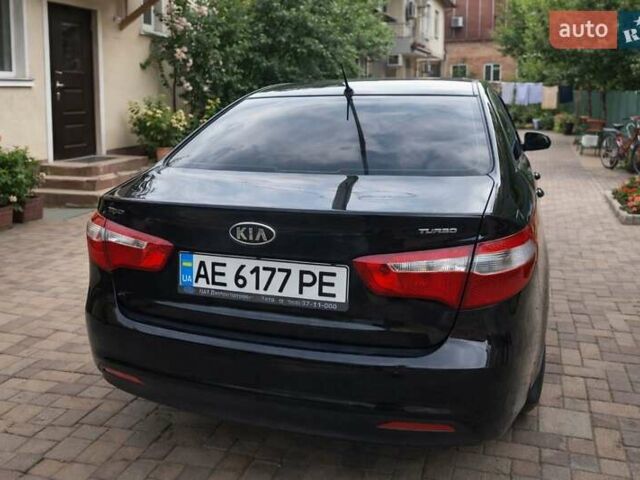 Чорний Кіа Ріо, об'ємом двигуна 1.59 л та пробігом 144 тис. км за 8700 $, фото 1 на Automoto.ua