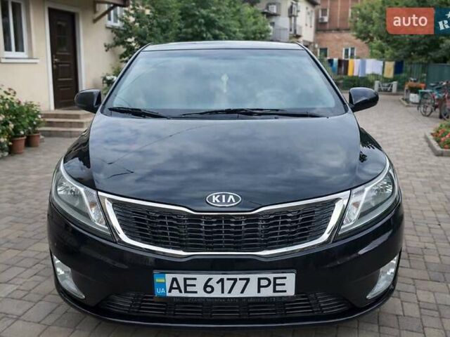 Чорний Кіа Ріо, об'ємом двигуна 1.59 л та пробігом 144 тис. км за 8700 $, фото 2 на Automoto.ua