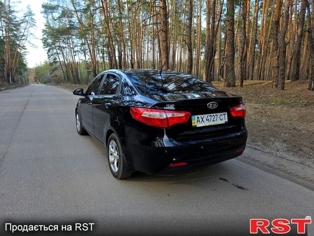 Черный Киа Рио, объемом двигателя 1.6 л и пробегом 103 тыс. км за 6800 $, фото 3 на Automoto.ua