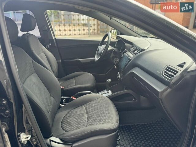 Черный Киа Рио, объемом двигателя 1.4 л и пробегом 155 тыс. км за 7500 $, фото 23 на Automoto.ua