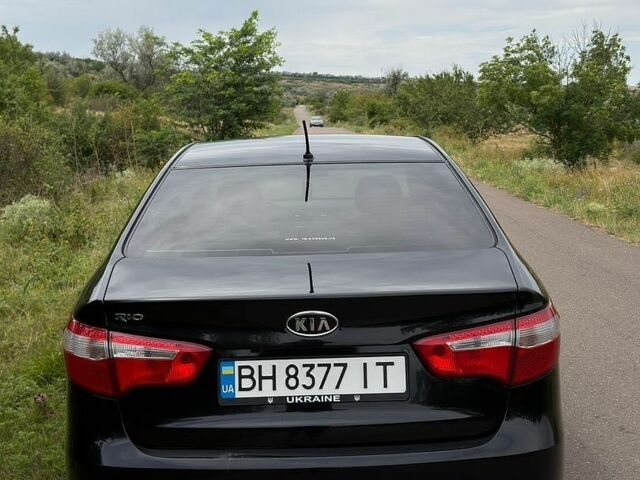 Чорний Кіа Ріо, об'ємом двигуна 1.6 л та пробігом 104 тис. км за 8500 $, фото 14 на Automoto.ua