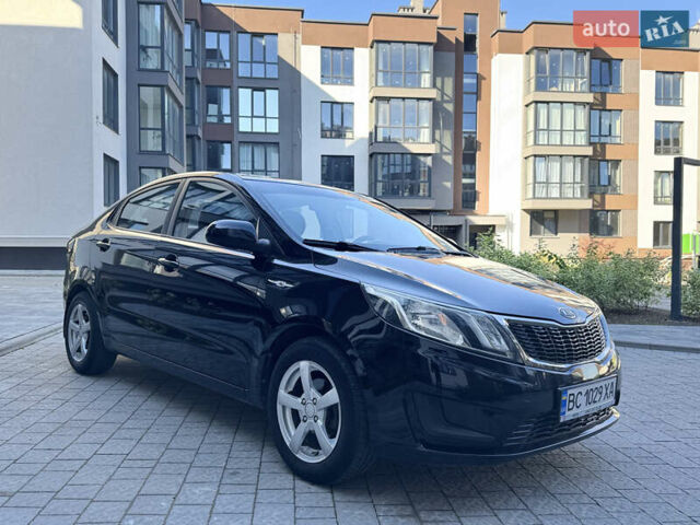 Чорний Кіа Ріо, об'ємом двигуна 1.4 л та пробігом 199 тис. км за 5950 $, фото 8 на Automoto.ua