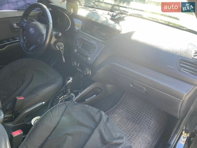 Чорний Кіа Ріо, об'ємом двигуна 1.59 л та пробігом 274 тис. км за 7500 $, фото 7 на Automoto.ua