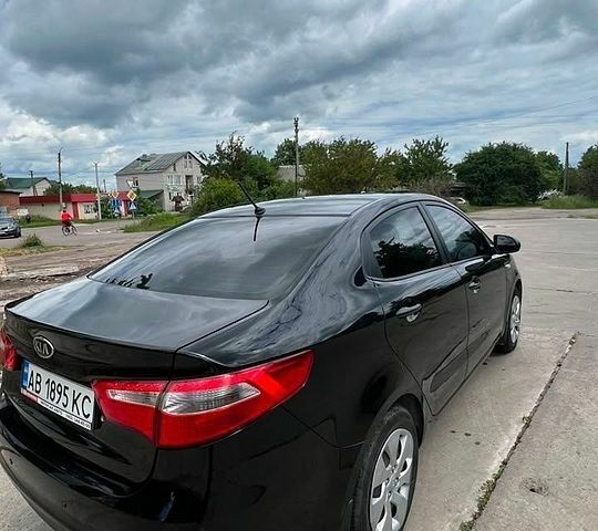 Чорний Кіа Ріо, об'ємом двигуна 1.4 л та пробігом 199 тис. км за 8800 $, фото 1 на Automoto.ua