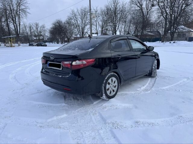 Черный Киа Рио, объемом двигателя 1.4 л и пробегом 160 тыс. км за 7200 $, фото 2 на Automoto.ua