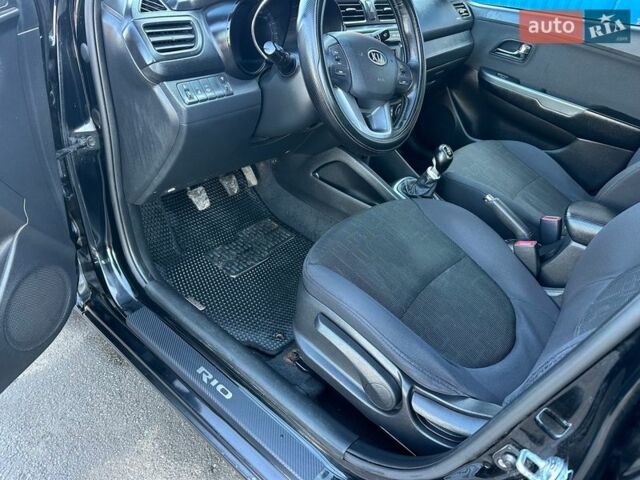 Чорний Кіа Ріо, об'ємом двигуна 1.59 л та пробігом 197 тис. км за 5888 $, фото 22 на Automoto.ua