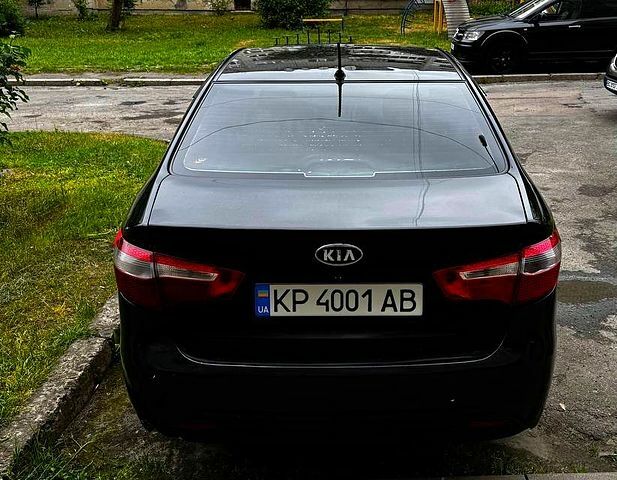 Черный Киа Рио, объемом двигателя 1.6 л и пробегом 330 тыс. км за 5700 $, фото 6 на Automoto.ua