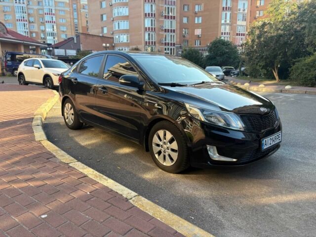 Черный Киа Рио, объемом двигателя 1.6 л и пробегом 292 тыс. км за 7020 $, фото 1 на Automoto.ua