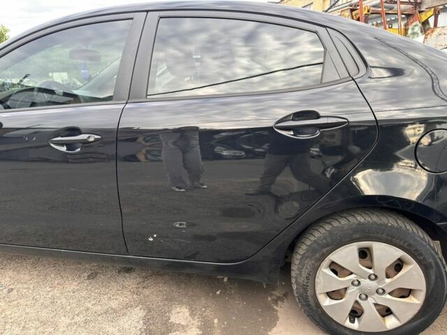 Чорний Кіа Ріо, об'ємом двигуна 1.4 л та пробігом 230 тис. км за 5000 $, фото 7 на Automoto.ua