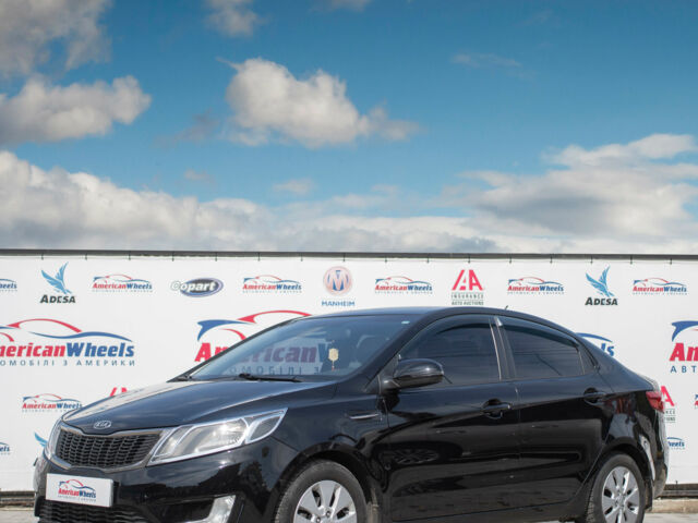 Чорний Кіа Ріо, об'ємом двигуна 1.6 л та пробігом 144 тис. км за 9500 $, фото 1 на Automoto.ua