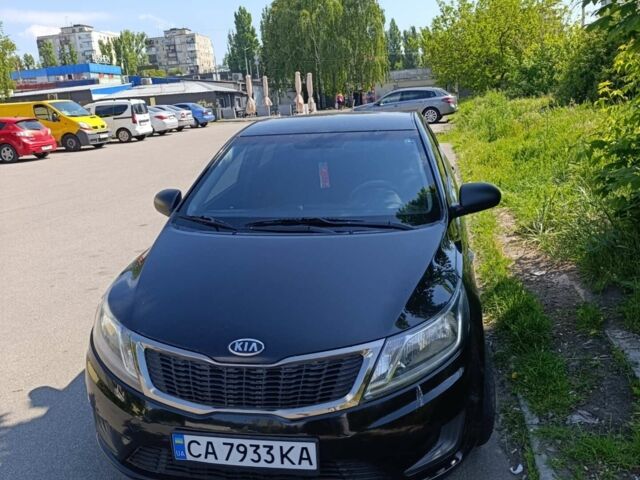 Чорний Кіа Ріо, об'ємом двигуна 1.4 л та пробігом 162 тис. км за 7500 $, фото 2 на Automoto.ua