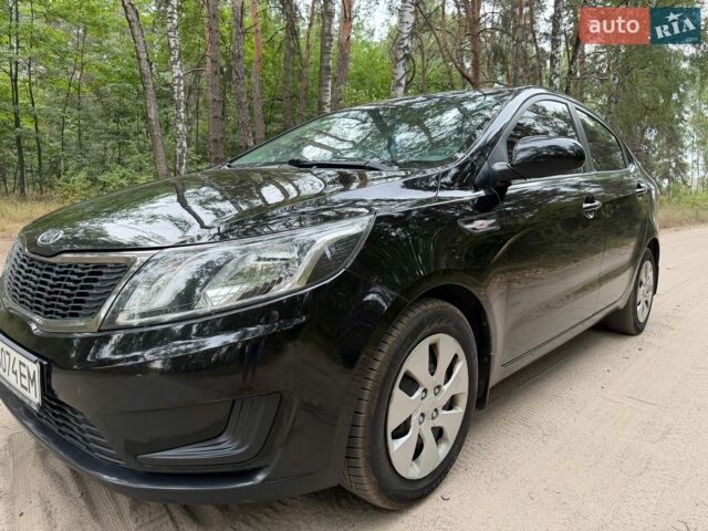 Чорний Кіа Ріо, об'ємом двигуна 1.4 л та пробігом 193 тис. км за 6300 $, фото 1 на Automoto.ua