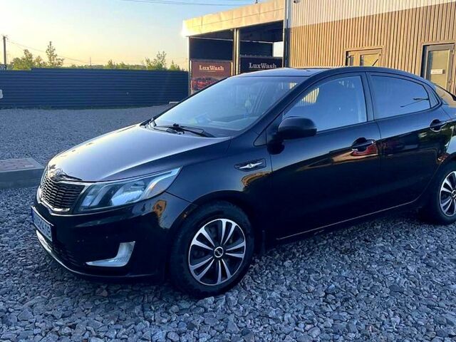 Черный Киа Рио, объемом двигателя 1.6 л и пробегом 201 тыс. км за 8000 $, фото 2 на Automoto.ua