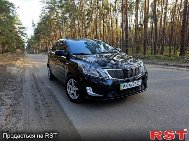 Черный Киа Рио, объемом двигателя 1.6 л и пробегом 103 тыс. км за 6800 $, фото 2 на Automoto.ua