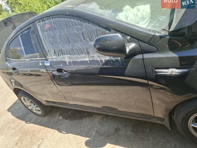 Черный Киа Рио, объемом двигателя 1.4 л и пробегом 255 тыс. км за 2200 $, фото 3 на Automoto.ua