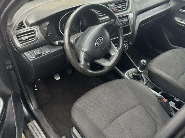 Черный Киа Рио, объемом двигателя 1.4 л и пробегом 100 тыс. км за 3200 $, фото 3 на Automoto.ua