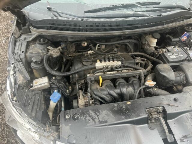 Черный Киа Рио, объемом двигателя 1.4 л и пробегом 120 тыс. км за 3000 $, фото 5 на Automoto.ua