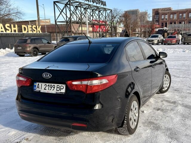 Чорний Кіа Ріо, об'ємом двигуна 1.6 л та пробігом 270 тис. км за 6499 $, фото 6 на Automoto.ua