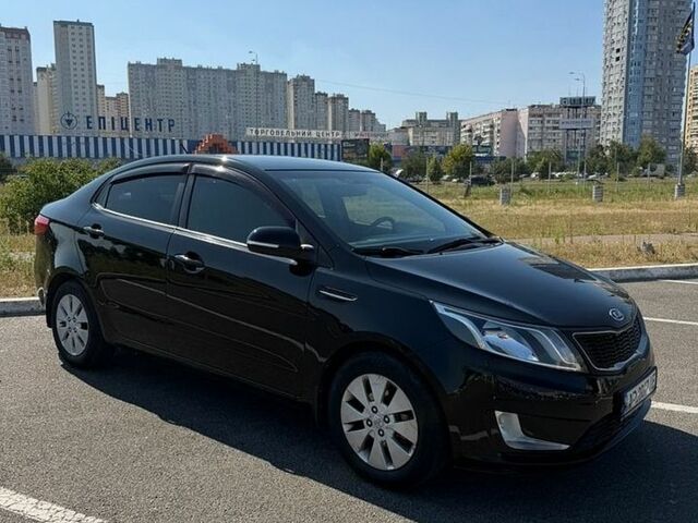 Чорний Кіа Ріо, об'ємом двигуна 1.59 л та пробігом 230 тис. км за 7000 $, фото 1 на Automoto.ua
