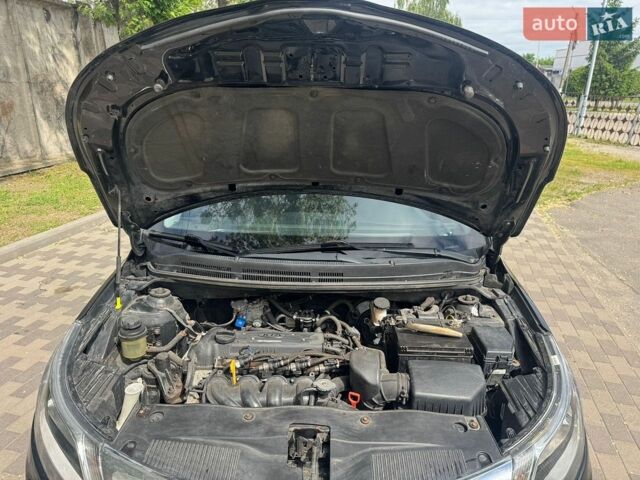 Черный Киа Рио, объемом двигателя 1.4 л и пробегом 155 тыс. км за 7500 $, фото 29 на Automoto.ua