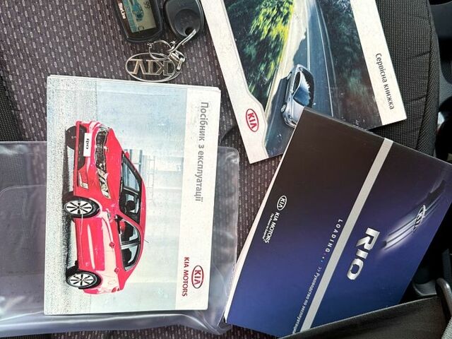 Чорний Кіа Ріо, об'ємом двигуна 1.4 л та пробігом 74 тис. км за 9100 $, фото 4 на Automoto.ua