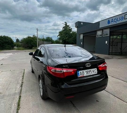 Чорний Кіа Ріо, об'ємом двигуна 1.4 л та пробігом 199 тис. км за 8800 $, фото 2 на Automoto.ua