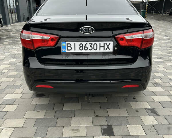 Черный Киа Рио, объемом двигателя 1.4 л и пробегом 111 тыс. км за 7500 $, фото 4 на Automoto.ua