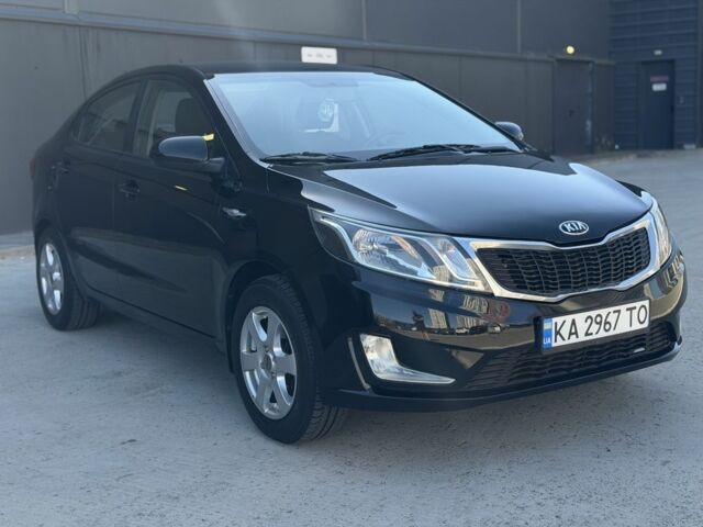 Чорний Кіа Ріо, об'ємом двигуна 1.4 л та пробігом 201 тис. км за 6948 $, фото 6 на Automoto.ua