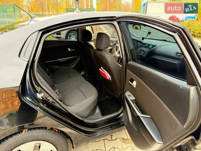 Чорний Кіа Ріо, об'ємом двигуна 1.6 л та пробігом 392 тис. км за 4500 $, фото 22 на Automoto.ua