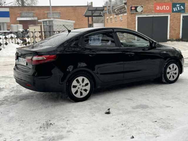 Черный Киа Рио, объемом двигателя 1.4 л и пробегом 155 тыс. км за 7500 $, фото 8 на Automoto.ua