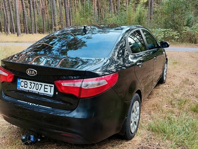 Чорний Кіа Ріо, об'ємом двигуна 0 л та пробігом 125 тис. км за 7099 $, фото 1 на Automoto.ua