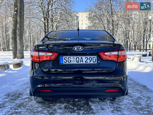 Чорний Кіа Ріо, об'ємом двигуна 1.4 л та пробігом 245 тис. км за 7600 $, фото 18 на Automoto.ua