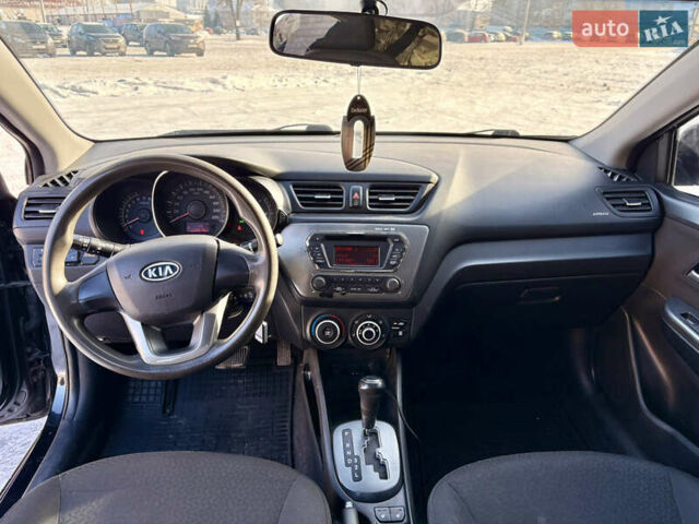 Черный Киа Рио, объемом двигателя 1.6 л и пробегом 270 тыс. км за 6650 $, фото 9 на Automoto.ua