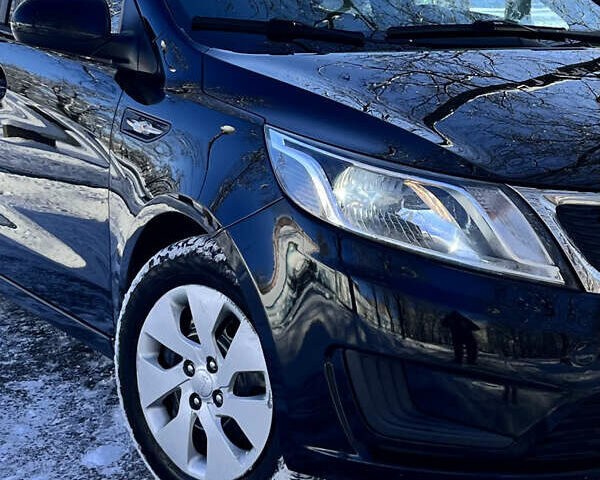 Чорний Кіа Ріо, об'ємом двигуна 1.4 л та пробігом 245 тис. км за 7600 $, фото 6 на Automoto.ua