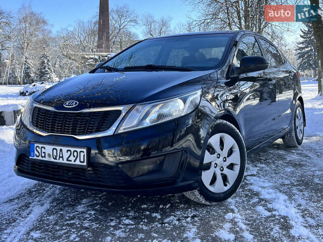 Чорний Кіа Ріо, об'ємом двигуна 1.4 л та пробігом 245 тис. км за 7600 $, фото 3 на Automoto.ua